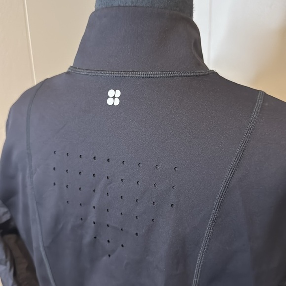 SWEATY BETTY Black Power Hybrid Workout Athleisure Jacket. Zipper front. Large. - Picture 6 of 10